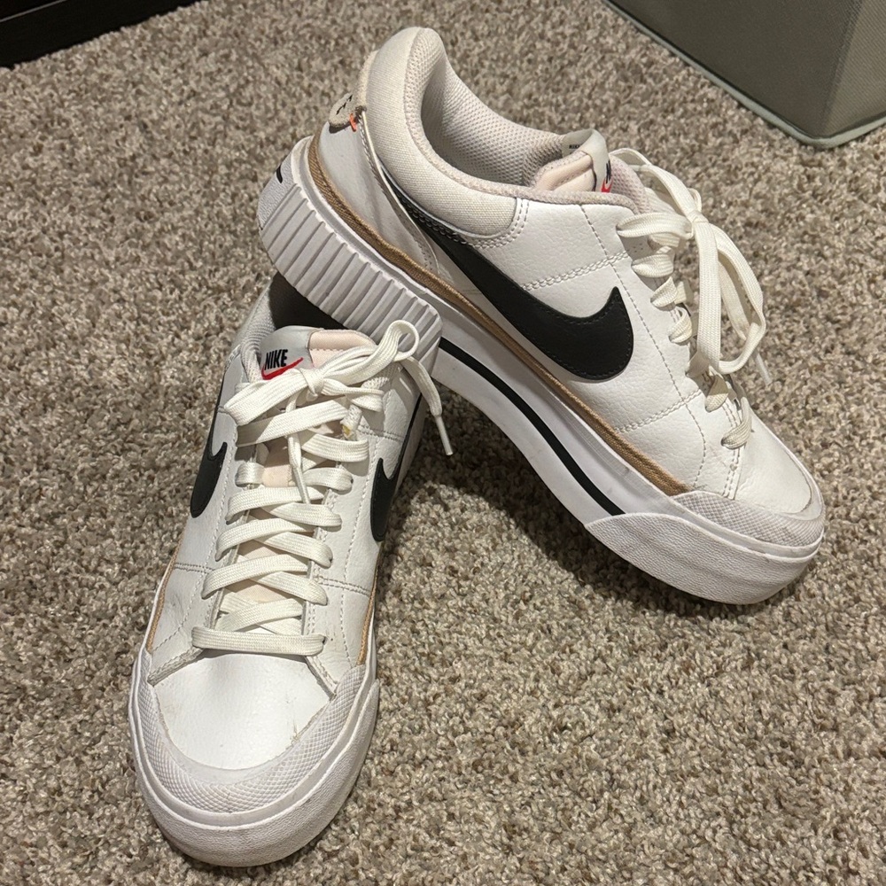 Nike Women’s White Sneakers with Black Swoosh and Tan Accent